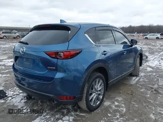 2020 Mazda CX-5 Grand Touring with VIN JM3KFBDM2L0778831, listed as a IAAI auction lot 41739655 with 72,533 mi miles. Bid and sale history available at carsss.com. Image 4.