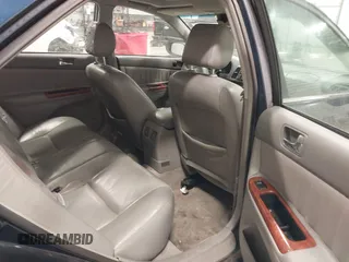 2003 Toyota Camry LE with VIN 4T1BE30K03U152348, listed as a IAAI auction lot 42082892 with 224,721 mi miles and . Bid and sale history available at DreamBid. Image 8.