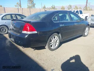 2015 Chevrolet Impala Limited LTZ with VIN 2G1WC5E31F1162663, listed as a IAAI auction lot 41457571 with 239,363 mi miles. Bid and sale history available at carsss.com. Image 4.