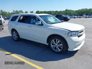 2011 Dodge Durango R/T with VIN 1D4SD6GT0BC707703, listed as a IAAI auction lot 42126478 with 153,770 mi miles and . Bid and sale history available at carsss.com. Image 1.