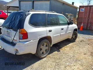 2004 GMC Envoy SLE with VIN 1GKDT13S442223832, listed as a IAAI auction lot 41845628 with 265,898 mi miles. Bid and sale history available at carsss.com. Image 4.