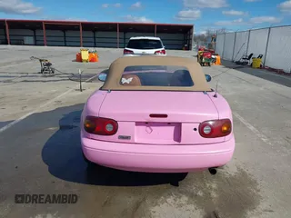 1993 Mazda MX-5 Miata with VIN JM1NA3519P1418681, listed as a IAAI auction lot 41741615 with 115,379 mi miles and . Bid and sale history available at DreamBid. Image 16.