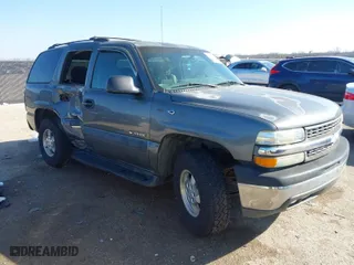 2002 Chevrolet Tahoe LT with VIN 1GNEC13Z12J233208, listed as a IAAI auction lot 41659873 with 238,922 mi miles. Bid and sale history available at carsss.com. Image 1.