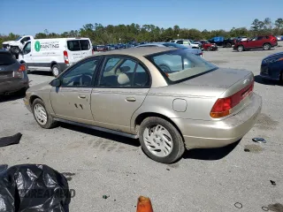1999 Saturn SL с VIN 1G8ZK527XXZ111390, выставлен на аукционе Copart как лот 49042185 с пробегом 164 733 миль миль и Списание • Salvage title. История ставок и продаж доступна на DreamBid. Изображение 2.