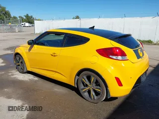 2013 Hyundai Veloster w/Gray Int with VIN KMHTC6AD8DU093272, listed as a IAAI auction lot 40407768 with 91,038 mi miles and . Bid and sale history available at DreamBid. Image 3.