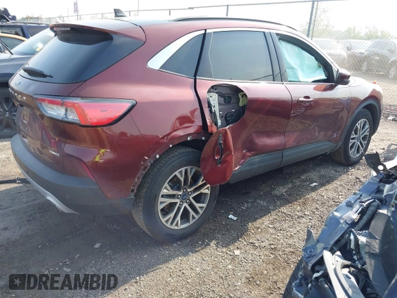 2021 Ford Escape SEL with VIN 1FMCU9H60MUA61602, listed as a IAAI auction lot 42476639 with 81,688 mi miles and . Bid and sale history available at DreamBid. Image 4.