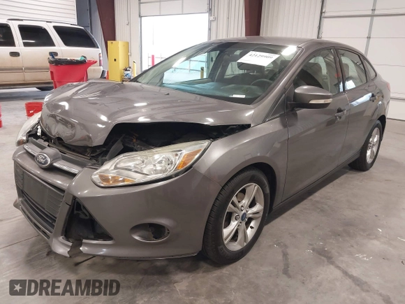 2013 Ford Focus SE with VIN 1FADP3F26DL359581, listed as a IAAI auction lot 42129909 with 129,832 mi miles. Bid and sale history available at carsss.com. Image 2.