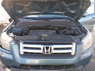 2007 Honda Pilot EX-L with VIN 5FNYF285X7B045780, listed as a IAAI auction lot 41324224 with 168,911 mi miles. Bid and sale history available at carsss.com. Image 10.