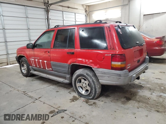 1997 Jeep Grand Cherokee Laredo with VIN 1J4GZ58Y9VC629994, listed as a Copart auction lot 83086694 with 252,147 mi miles and Salvage Title. Bid and sale history available at carsss.com. Image 2.