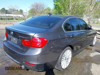 2013 BMW 3 Series ActiveHybrid 3 with VIN WBA3F9C5XDF484346, listed as a IAAI auction lot 41998341 with 145,271 mi miles. Bid and sale history available at carsss.com. Image 4.