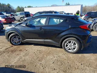 2021 Toyota C-HR LE with VIN NMTKHMBXXMR123633, listed as a IAAI auction lot 40787336 with 28,234 mi miles. Bid and sale history available at carsss.com. Image 14.