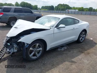 2021 Ford Mustang EcoBoost with VIN 1FA6P8THXM5153232, listed as a IAAI auction lot 42458757 with 45,267 mi miles and . Bid and sale history available at DreamBid. Image 16.