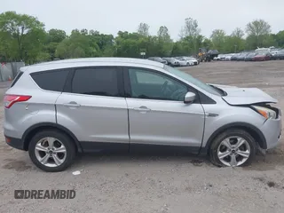 2015 Ford Escape SE z VIN 1FMCU0G73FUB10414, wystawiony jako IAAI lot #42173063 z przebiegiem 120 200 mil mil oraz . Historia ofert i sprzedaży dostępna na DreamBid. Obrazek 14.