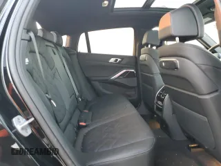 2025 BMW X6 xDrive40i with VIN 5UX33EX09S9Y26463, listed as a Copart auction lot 84269334 with 1,970 mi miles and Salvage Title. Bid and sale history available at carsss.com. Image 11.