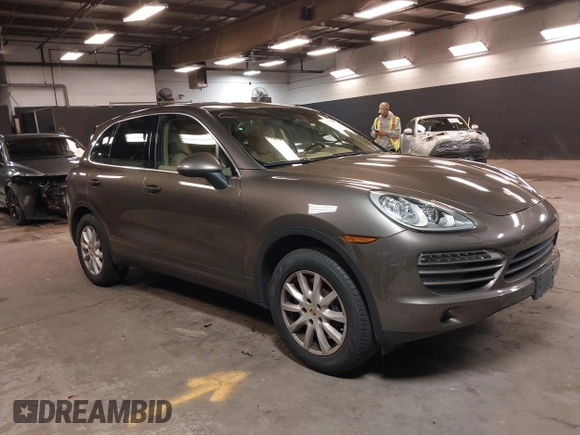 2014 Porsche Cayenne with VIN WP1AA2A26ELA93026, listed as a IAAI auction lot 42272409 with 58,951 mi miles and . Bid and sale history available at DreamBid. Image 1.