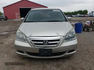 2007 Honda Odyssey EX with VIN 5FNRL38427B513477, listed as a Copart auction lot 62457695 with 216,977 mi miles and Salvage title. Bid and sale history available at DreamBid. Image 5.