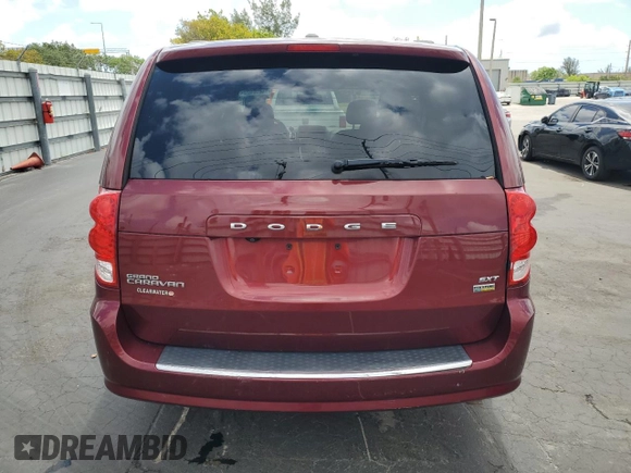 2019 Dodge Grand Caravan SXT with VIN 2C4RDGCGXKR807759, listed as a Copart auction lot 56098575 with 119,268 mi miles and Salvage Title. Bid and sale history available at DreamBid. Image 6.