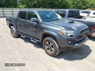 2019 Toyota Tacoma SR z VIN 3TMCZ5AN7KM195380, wystawiony jako IAAI lot #42659080 z przebiegiem 105 174 mil mil oraz . Historia ofert i sprzedaży dostępna na DreamBid. Obrazek 1.