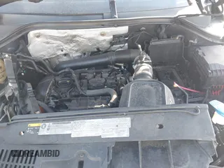 2014 Volkswagen Tiguan S z VIN WVGBV3AX7EW545538, wystawiony jako IAAI lot #42083281 z przebiegiem 129 227 mil mil oraz . Historia ofert i sprzedaży dostępna na DreamBid. Obrazek 10.