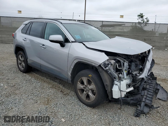 2022 Toyota RAV4 XLE with VIN 2T3W1RFV7NC192617, listed as a Copart auction lot 59564535 with 70,635 mi miles and Salvage title. Bid and sale history available at DreamBid. Image 4.