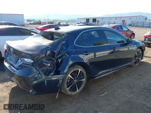 2020 Toyota Camry XSE with VIN 4T1K61AK0LU320375, listed as a IAAI auction lot 42126158 with 99,470 mi miles and . Bid and sale history available at DreamBid. Image 4.