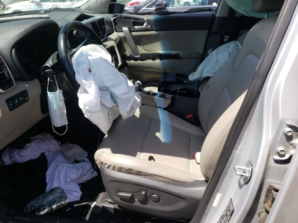 2020 Kia Sportage EX with VIN KNDPN3AC8L7780402, listed as a Copart auction lot 55964355 with 91,728 mi miles and Salvage title. Bid and sale history available at DreamBid. Image 7.