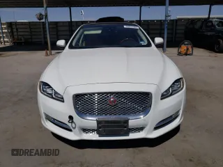2019 Jaguar XJ Portfolio with VIN SAJWA2G72K8W21087, listed as a Copart auction lot 66017344 with 22,671 mi miles and Salvage Title. Bid and sale history available at DreamBid. Image 5.