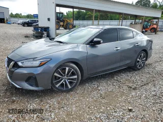 2020 Nissan Maxima SL with VIN 1N4AA6DV1LC364544, listed as a Copart auction lot 58771915 with 112,498 mi miles and Salvage title. Bid and sale history available at DreamBid. Image 1.