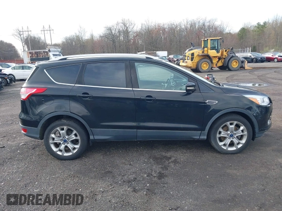 2014 Ford Escape Titanium with VIN 1FMCU9J98EUD73818, listed as a IAAI auction lot 42036442 with 129,794 mi miles. Bid and sale history available at carsss.com. Image 13.