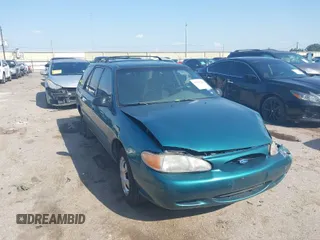 1997 Ford Escort LX with VIN 3FALP15P7VR158272, listed as a IAAI auction lot 41833216 with 148,170 mi miles. Bid and sale history available at carsss.com. Image 1.
