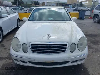 2003 Mercedes-Benz E-Class 3.2L with VIN WDBUF65J23A120318, listed as a IAAI auction lot 41927993 with 113,578 mi miles. Bid and sale history available at carsss.com. Image 12.