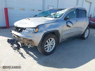 2018 Jeep Grand Cherokee Laredo E with VIN 1C4RJFAG8JC130465, listed as a IAAI auction lot 41789688 with 133,299 mi miles. Bid and sale history available at carsss.com. Image 18.