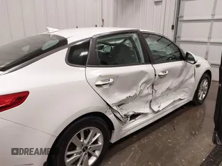2016 Kia Optima LX with VIN 5XXGT4L38GG048180, listed as a IAAI auction lot 41923650 with 58,018 mi miles. Bid and sale history available at carsss.com. Image 6.