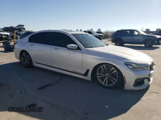 2017 BMW 7 Series 750i with VIN WBA7F0C52HGM21383, listed as a Copart auction lot 85540974 with 151,708 mi miles and Salvage title. Bid and sale history available at DreamBid. Image 4.