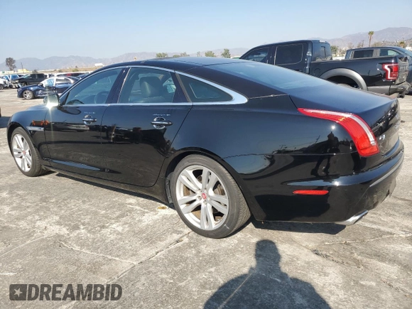 2011 Jaguar XJ with VIN SAJWA1CB4BLV05830, listed as a Copart auction lot 43007345 with 72,933 mi miles and Salvage title. Bid and sale history available at DreamBid. Image 2.