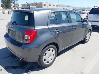 2008 Scion xD with VIN JTKKU10438J027228, listed as a IAAI auction lot 41973795 with 205,044 mi miles. Bid and sale history available at carsss.com. Image 4.