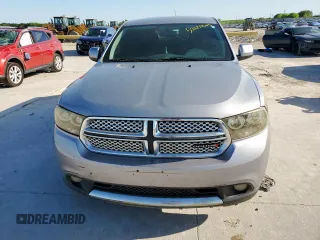 2013 Dodge Durango SXT z VIN 1C4RDHAGXDC697865, wystawiony jako Copart lot #52635305 z przebiegiem 206 980 mil mil oraz Czysty tytuł • Clean title. Historia ofert i sprzedaży dostępna na DreamBid. Obrazek 5.