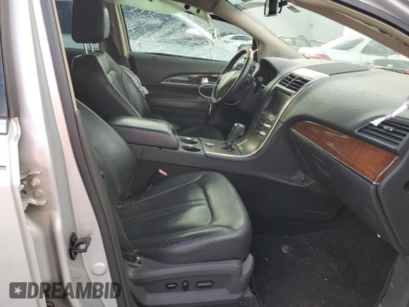 2015 Lincoln MKX with VIN 2LMDJ6JK8FBL28436, listed as a Copart auction lot 47573005 with 129,147 mi miles and Salvage Title. Bid and sale history available at carsss.com. Image 7.