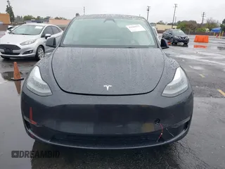 2024 Tesla Model Y Long Range with VIN 7SAYGDEE5RA241433, listed as a IAAI auction lot 41569277 with 7,490 mi miles. Bid and sale history available at carsss.com. Image 11.