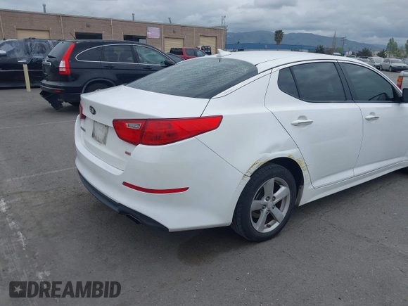 2015 Kia Optima LX with VIN KNAGM4A74F5662579, listed as a IAAI auction lot 42127251 with 144,138 mi miles and . Bid and sale history available at carsss.com. Image 6.