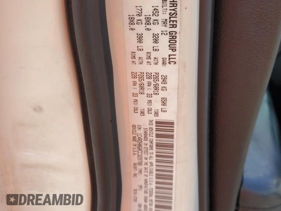 2012 Dodge Durango SXT z VIN 1C4RDHAG0CC329788, wystawiony jako Copart lot #61101745 z przebiegiem 208 302 mil mil oraz Szkoda całkowita • Salvage title. Historia ofert i sprzedaży dostępna na DreamBid. Obrazek 14.
