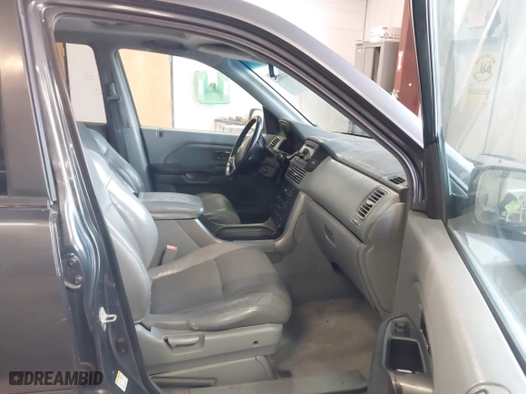 2005 Honda Pilot EX-L with RES with VIN 2HKYF18655H521175, listed as a IAAI auction lot 41490812 with 357,033 mi miles. Bid and sale history available at carsss.com. Image 5.