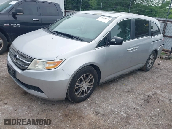 2012 Honda Odyssey EX-L with VIN 5FNRL5H66CB081323, listed as a IAAI auction lot 42465110 with 266,934 mi miles and . Bid and sale history available at DreamBid. Image 19.