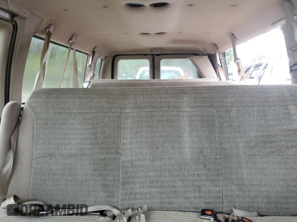 2001 Ford Econoline Passenger XL with VIN 1FBSS31LX1HA23564, listed as a Copart auction lot 77703044 with 276,538 mi miles and Salvage title. Bid and sale history available at DreamBid. Image 10.