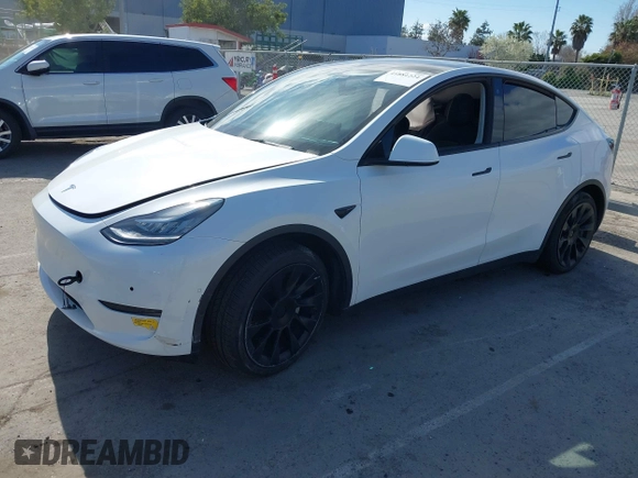 2022 Tesla Model Y Long Range with VIN 7SAYGDEE0NF340822, listed as a IAAI auction lot 41881224 with Not Provided miles and . Bid and sale history available at DreamBid. Image 18.