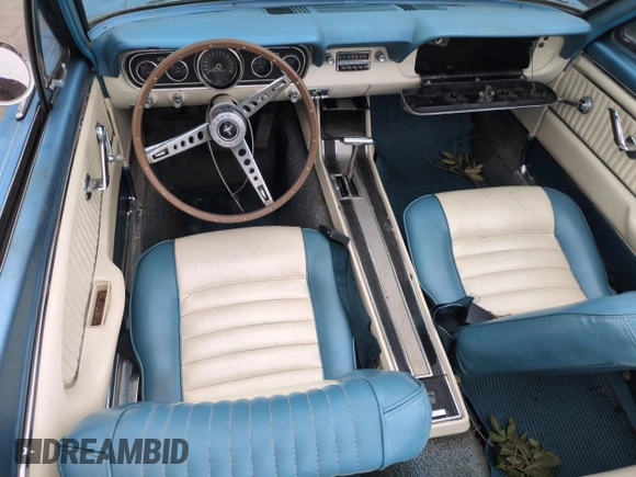 1966 Ford Mustang z VIN 6R08T191465, wystawiony jako Copart lot #74263644 z przebiegiem 54 288 mil mil oraz Szkody całkowita. Historia ofert i sprzedaży dostępna na DreamBid. Obrazek 8.