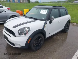 2013 MINI Countryman S ALL4 with VIN WMWZC5C5XDWP31652, listed as a IAAI auction lot 42127716 with 82,601 mi miles and . Bid and sale history available at DreamBid. Image 2.