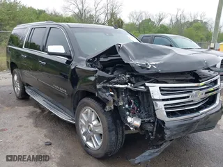 2015 Chevrolet Suburban LTZ with VIN 1GNSCKKC6FR271675, listed as a IAAI auction lot 41915036 with 150,917 mi miles. Bid and sale history available at carsss.com. Image 1.