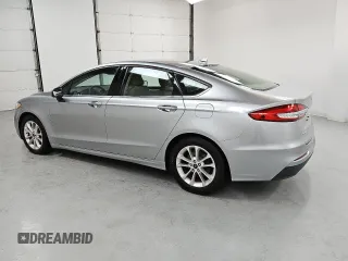 2020 Ford Fusion SE with VIN 3FA6P0H79LR129422, listed as a Copart auction lot 58748455 with 134,292 mi miles and Clean title. Bid and sale history available at DreamBid. Image 2.