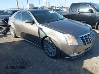 2012 Cadillac CTS Premium with VIN 1G6DS5E3XC0128264, listed as a IAAI auction lot 41964295 with 117,889 mi miles and . Bid and sale history available at DreamBid. Image 1.